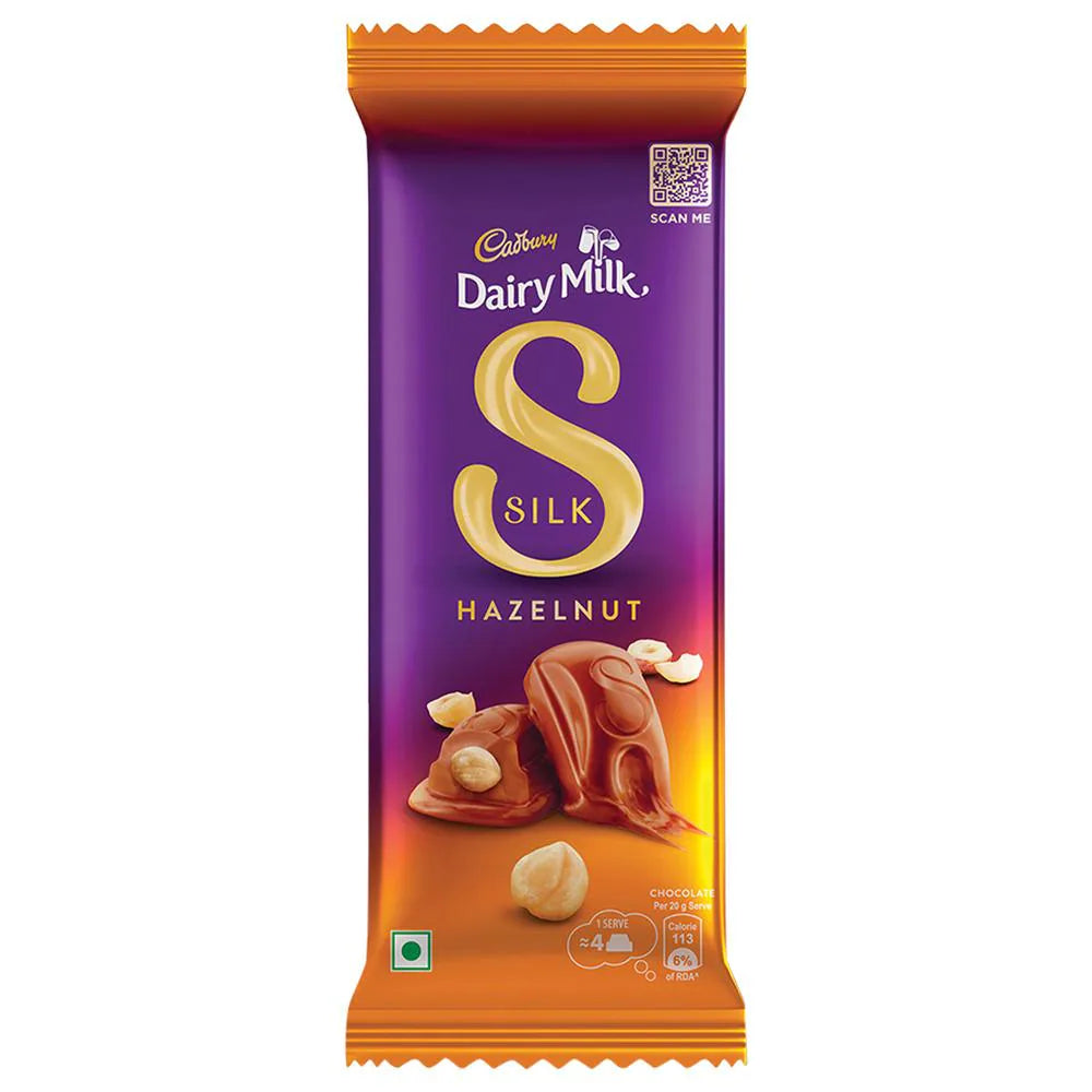 Cadbury Dairy Milk Silk Hazelnut Chocolate, creamy chocolate, hazelnuts, indulgence, symphony of flavors, crunchy texture, irresistible, treat, sharing, bliss.